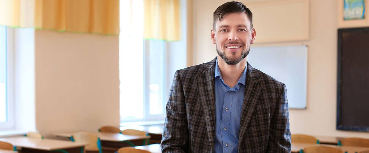 Male teacher with smiling with confidence
