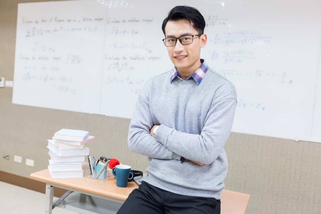 Asian young male teacher