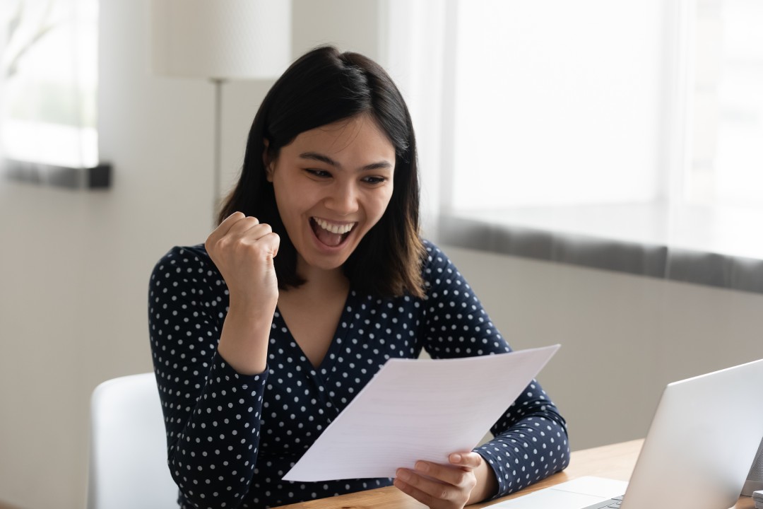 Amazed student hold official written letter